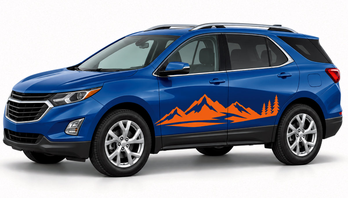 A blue Chevrolet SUV shown in a clean studio setting, featuring an orange mountain and pine tree graphic decal along the side.
