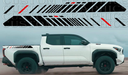 A white Toyota Tacoma pickup truck with a custom decal design on the side, featuring black and red stripes and the branding 'Brothers Graphics'.