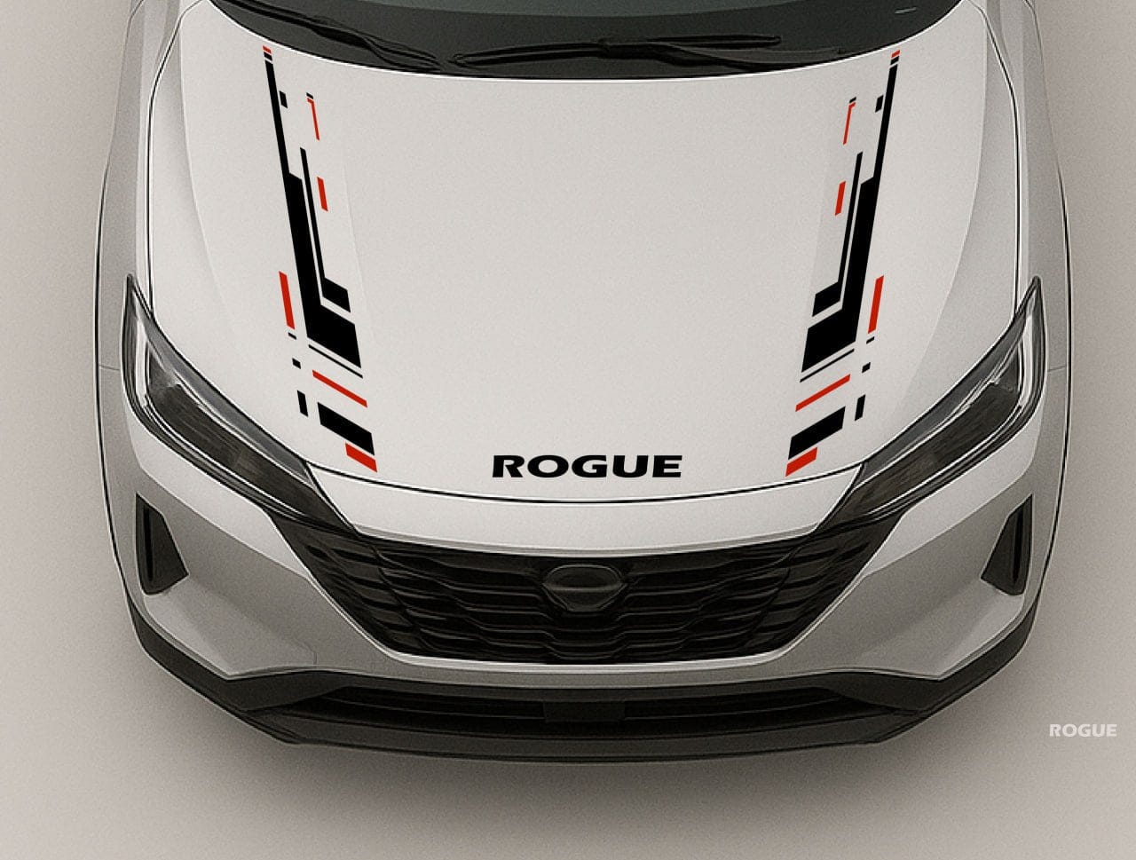 Front view of a Nissan Rogue with hood decal on a gray background