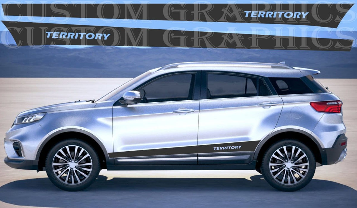 A silver SUV shown in side profile on a studio-style background, with a dark side decal reading TERRITORY. A large TERRITORY graphic banner is visible behind the vehicle.