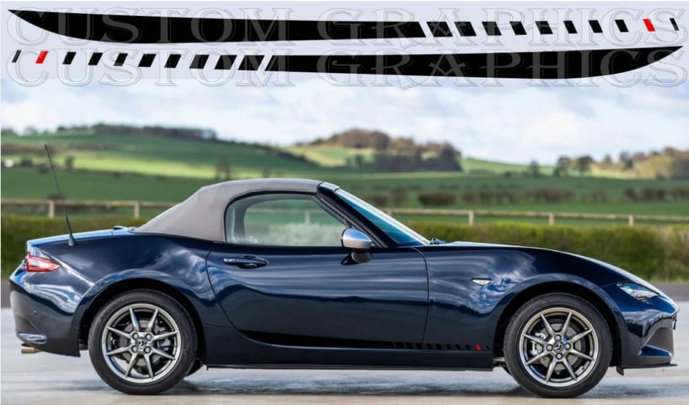 A dark blue Mazda MX-5 Miata convertible shown in side profile against a blurred green countryside background. A black vinyl roof decal strip is displayed at the top of the image with a film-strip graphic overlay.